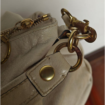 Coach Poppy Pocket Hobo 14681 – Ivory Leather Shoulder Bag, Gold Hardware, Double Front Pockets