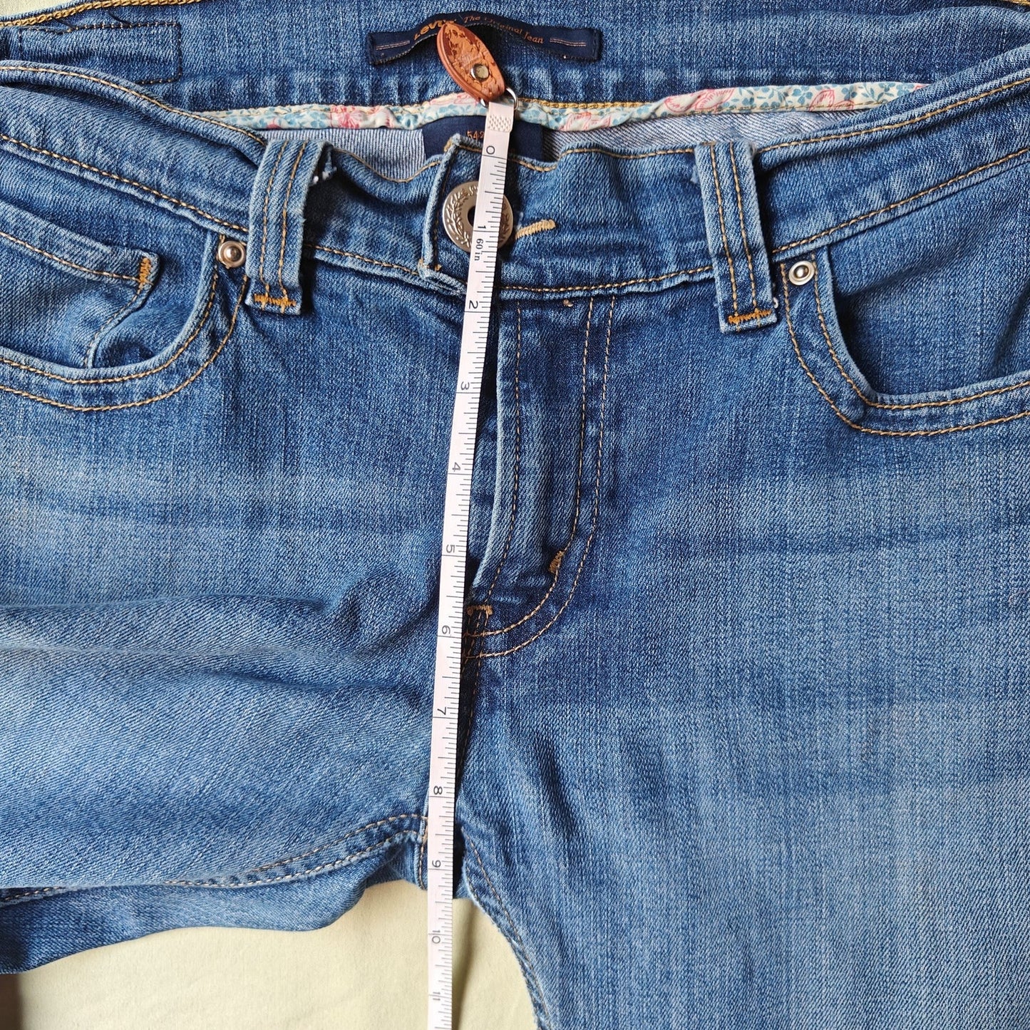 Levi’s 542 Bootcut Jeans Size 10 Medium Wash Raw Hem Stretch Denim