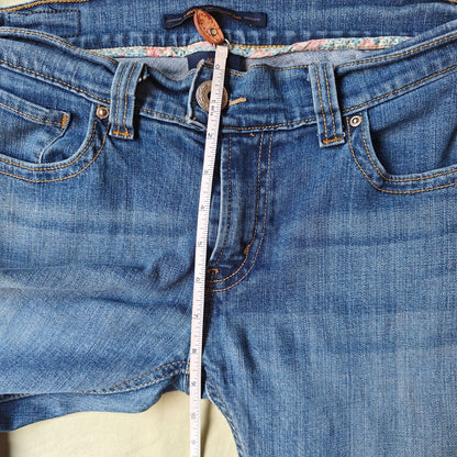 Levi’s 542 Bootcut Jeans Size 10 Medium Wash Raw Hem Stretch Denim